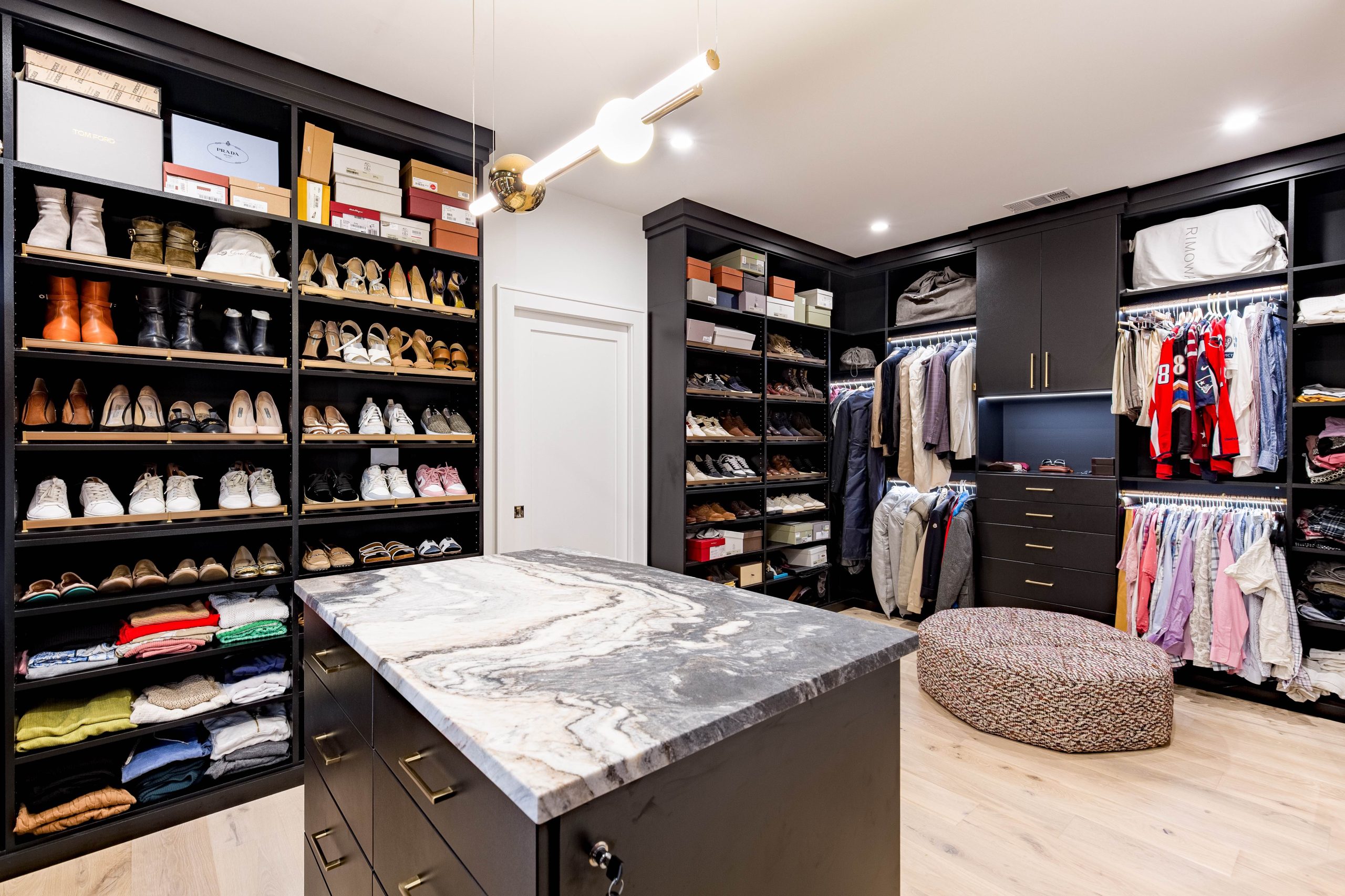 Well designed custom closet island Image of a well designed custom closet with closet island in Newport Beach