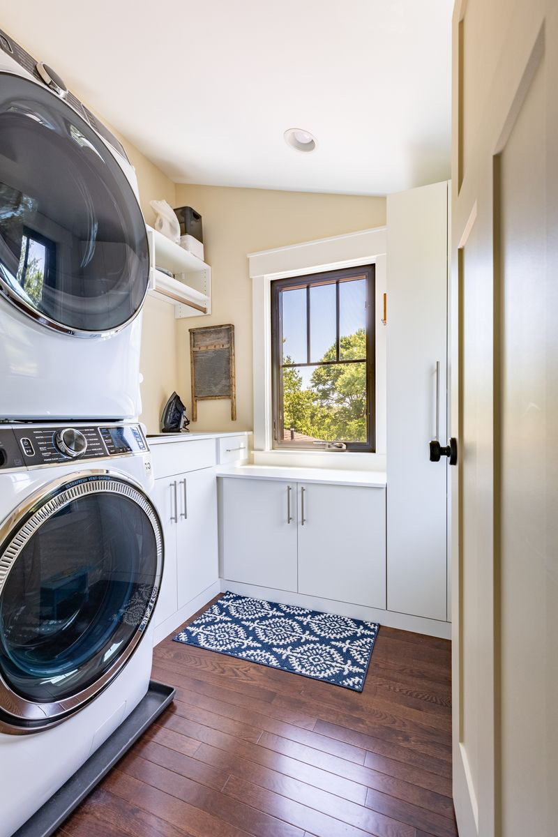 laundry room design Custom laundry room with storage closets