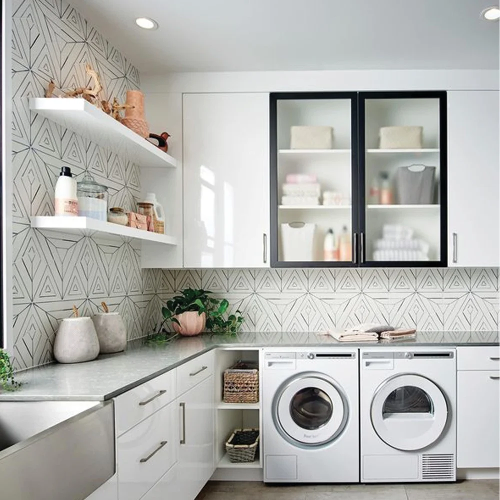Image of a remodeled laundry room with closets built-in.
